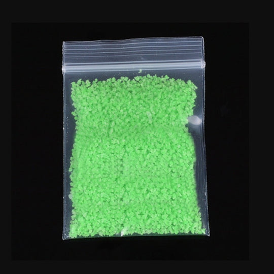 Fluorescent sand